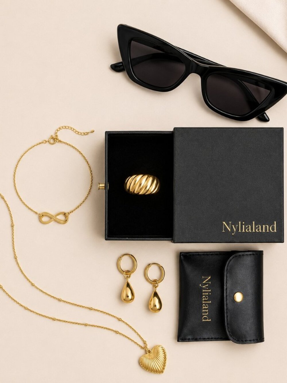 The Nylialand Curated Accessory Box Gold Essentials & Black Sunnies